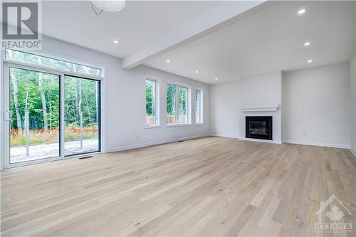 Family Room - 177 Lynn Coulter Street, Ottawa, ON - Indoor Photo Showing Living Room With Fireplace