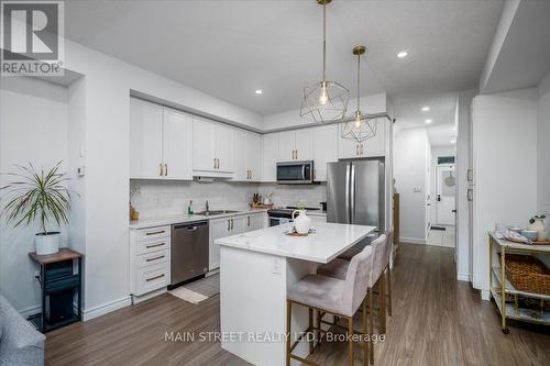 57 Gibson Avenue, Hamilton, ON - Indoor Photo Showing Kitchen With Stainless Steel Kitchen With Double Sink With Upgraded Kitchen