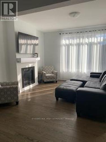 546 Anchor Circle, Ottawa, ON - Indoor Photo Showing Living Room With Fireplace