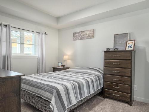 318-4830 Cedar Ridge Pl, Nanaimo, BC - Indoor Photo Showing Bedroom