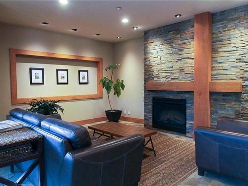 117-1395 Bear Mountain Pkwy, Langford, BC - Indoor With Fireplace