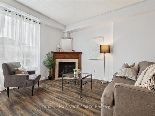 57 Marina Point Cres, Hamilton, ON - Indoor Photo Showing Living Room With Fireplace