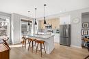 114-1435 Cara Glen Court, Kelowna, BC  - Indoor Photo Showing Kitchen With Stainless Steel Kitchen With Upgraded Kitchen 