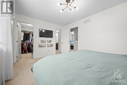 Walk in closet and semi ensuite - 713 Mayfly Crescent, Ottawa, ON - Indoor Photo Showing Bedroom