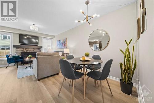 713 Mayfly Crescent, Ottawa, ON - Indoor Photo Showing Dining Room With Fireplace