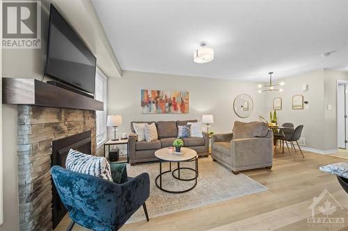 713 Mayfly Crescent, Ottawa, ON - Indoor Photo Showing Living Room With Fireplace