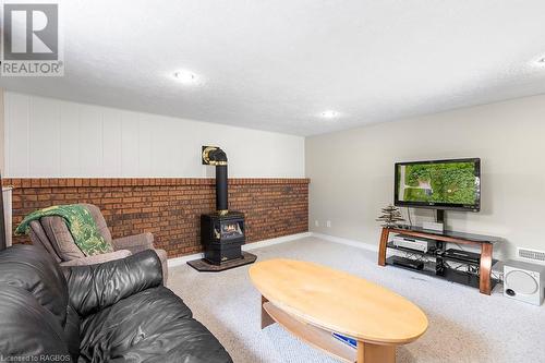 703021 Walker Sideroad, Chatsworth, ON - Indoor Photo Showing Living Room With Fireplace