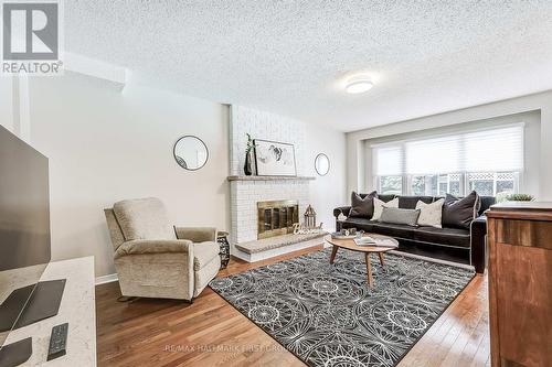 33 Rice Drive, Whitby (Pringle Creek), ON - Indoor Photo Showing Living Room With Fireplace