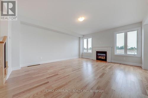 173 St Joseph Road, Kawartha Lakes, ON - Indoor Photo Showing Living Room With Fireplace