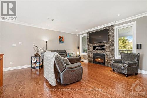 6275 Apple Orchard Road, Ottawa, ON - Indoor Photo Showing Living Room With Fireplace