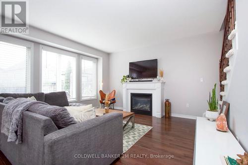 11 Oke Road, Clarington (Courtice), ON - Indoor Photo Showing Living Room With Fireplace