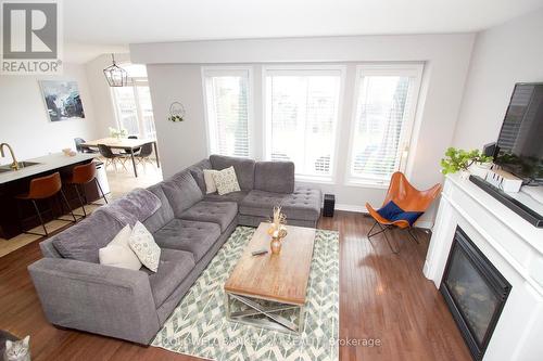 11 Oke Road, Clarington (Courtice), ON - Indoor Photo Showing Living Room With Fireplace