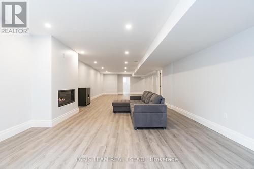 1532 Champlain Road, Tiny, ON - Indoor Photo Showing Other Room With Fireplace