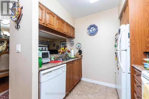 612 - 2088 Lawrence Avenue W, Toronto, ON - Indoor Photo Showing Kitchen With Double Sink