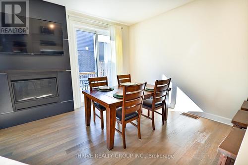 54 - 499 Sophia Crescent, London, ON - Indoor Photo Showing Dining Room With Fireplace