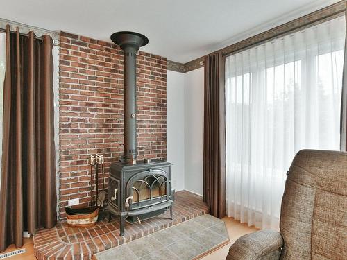 Salon - 37 Rue D'Argenson, Repentigny (Repentigny), QC - Indoor With Fireplace