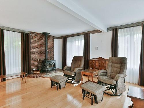 Salon - 37 Rue D'Argenson, Repentigny (Repentigny), QC - Indoor Photo Showing Living Room With Fireplace