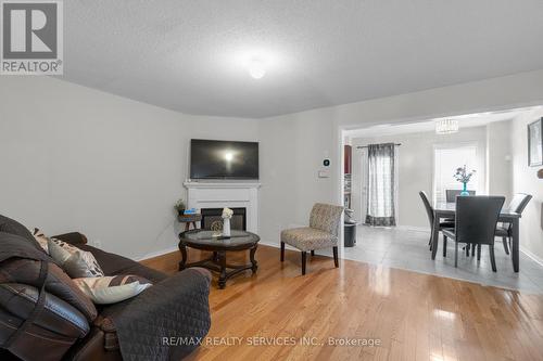 22 Tanasi Road, Brampton, ON - Indoor Photo Showing Living Room With Fireplace