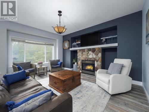 7174 Westgate Avenue, Prince George, BC - Indoor Photo Showing Living Room With Fireplace