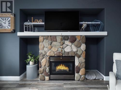 7174 Westgate Avenue, Prince George, BC - Indoor Photo Showing Living Room With Fireplace