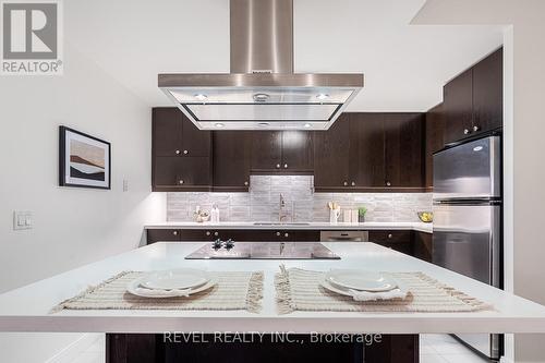 303 - 1 Scott Street, Toronto, ON - Indoor Photo Showing Kitchen