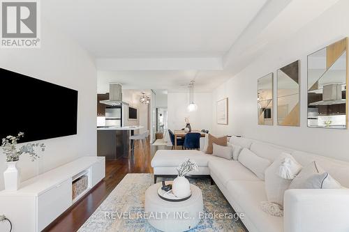 303 - 1 Scott Street, Toronto, ON - Indoor Photo Showing Living Room