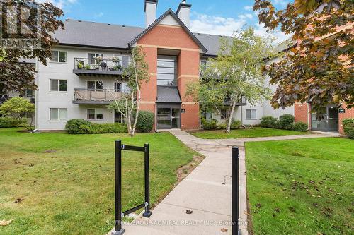 522 - 1450 Glen Abbey Gate, Oakville, ON - Outdoor With Balcony With Facade