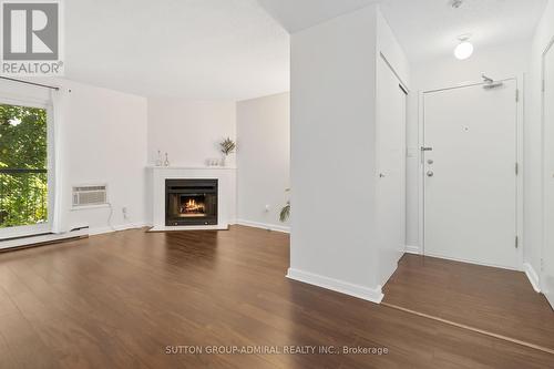 522 - 1450 Glen Abbey Gate, Oakville, ON - Indoor Photo Showing Living Room With Fireplace