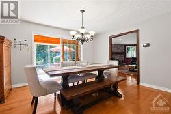 The adjoining formal dining room seamlessly connects to a solarium and back deck - 