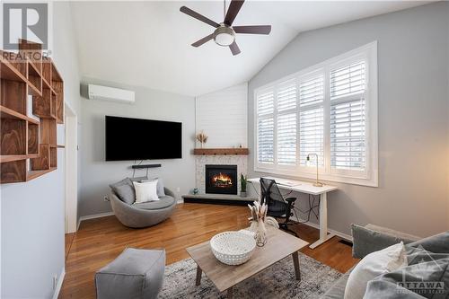 1691 Belcourt Boulevard, Ottawa, ON - Indoor Photo Showing Living Room With Fireplace