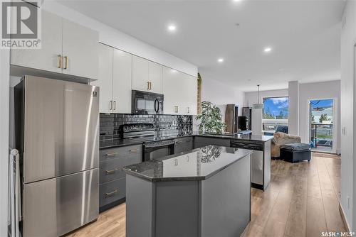 101 158 Pawlychenko Lane, Saskatoon, SK - Indoor Photo Showing Kitchen With Upgraded Kitchen