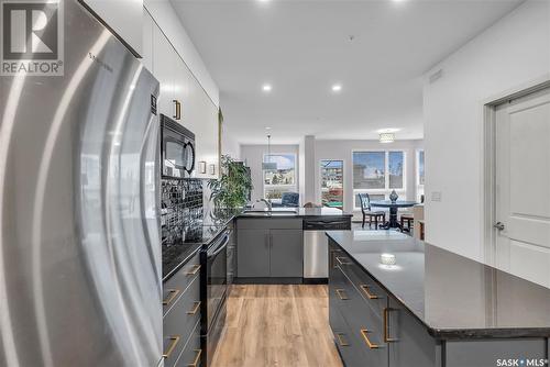 101 158 Pawlychenko Lane, Saskatoon, SK - Indoor Photo Showing Kitchen With Upgraded Kitchen