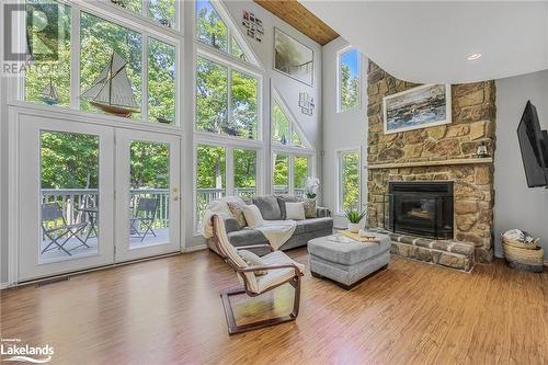 10 Musquake Court, Tiny Twp, ON - Indoor Photo Showing Living Room With Fireplace