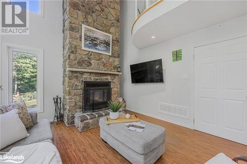 10 Musquake Court, Tiny Twp, ON - Indoor Photo Showing Living Room With Fireplace