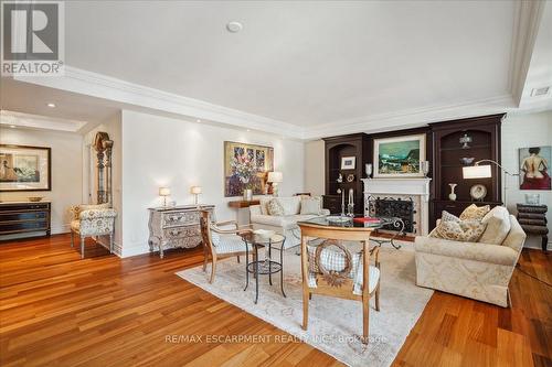 304 - 68 Yorkville Avenue N, Toronto, ON - Indoor Photo Showing Living Room With Fireplace