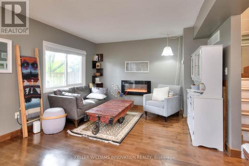 51 - 20 Paulander Drive, Kitchener, ON - Indoor Photo Showing Living Room With Fireplace