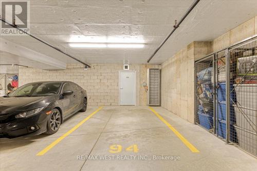 208 - 161 Wellington Street E, New Tecumseth, ON - Indoor Photo Showing Garage