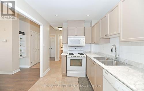 319 - 121 Woodbridge Avenue, Vaughan, ON - Indoor Photo Showing Kitchen With Double Sink