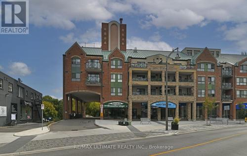 319 - 121 Woodbridge Avenue, Vaughan, ON - Outdoor With Balcony With Facade