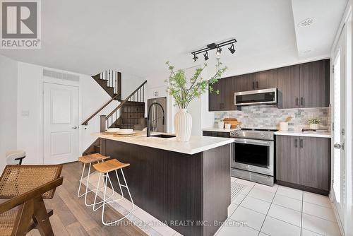 108 - 100 Parrotta Drive, Toronto, ON - Indoor Photo Showing Kitchen With Upgraded Kitchen