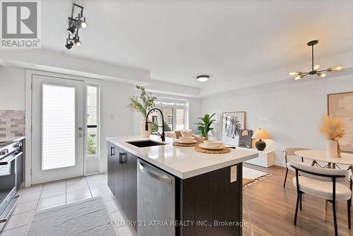 108 - 100 Parrotta Drive, Toronto, ON - Indoor Photo Showing Kitchen With Upgraded Kitchen