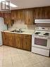 Bsmt - 12 Pendrith Street, Toronto, ON  - Indoor Photo Showing Kitchen With Double Sink 