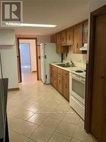 Bsmt - 12 Pendrith Street, Toronto, ON - Indoor Photo Showing Kitchen