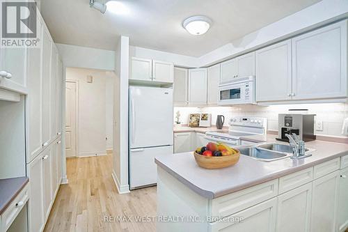 15 - 1735 The Collegeway, Mississauga, ON - Indoor Photo Showing Kitchen With Double Sink