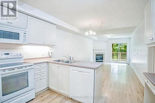 15 - 1735 The Collegeway, Mississauga, ON - Indoor Photo Showing Kitchen With Double Sink