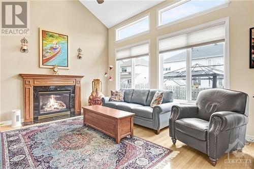 1144 Rocky Harbour Crescent, Ottawa, ON - Indoor Photo Showing Living Room With Fireplace