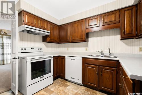 1042 Gryphons Walk, Regina, SK - Indoor Photo Showing Kitchen With Double Sink