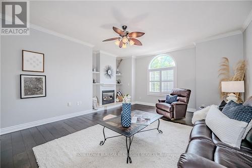 83 - 3333 New Street, Burlington, ON - Indoor Photo Showing Living Room With Fireplace