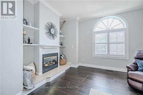 83 - 3333 New Street, Burlington, ON - Indoor Photo Showing Living Room With Fireplace