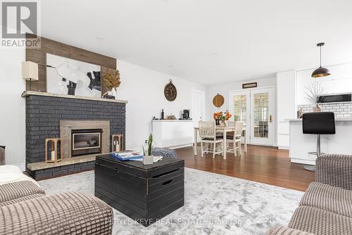 100 Meadow Heights Drive, Bracebridge, ON - Indoor Photo Showing Living Room With Fireplace